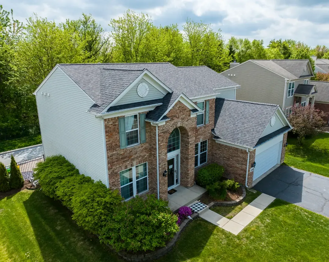 Completed Carpentersville IL roof replacement with Owens Corning Williamsburg Gray shingles
