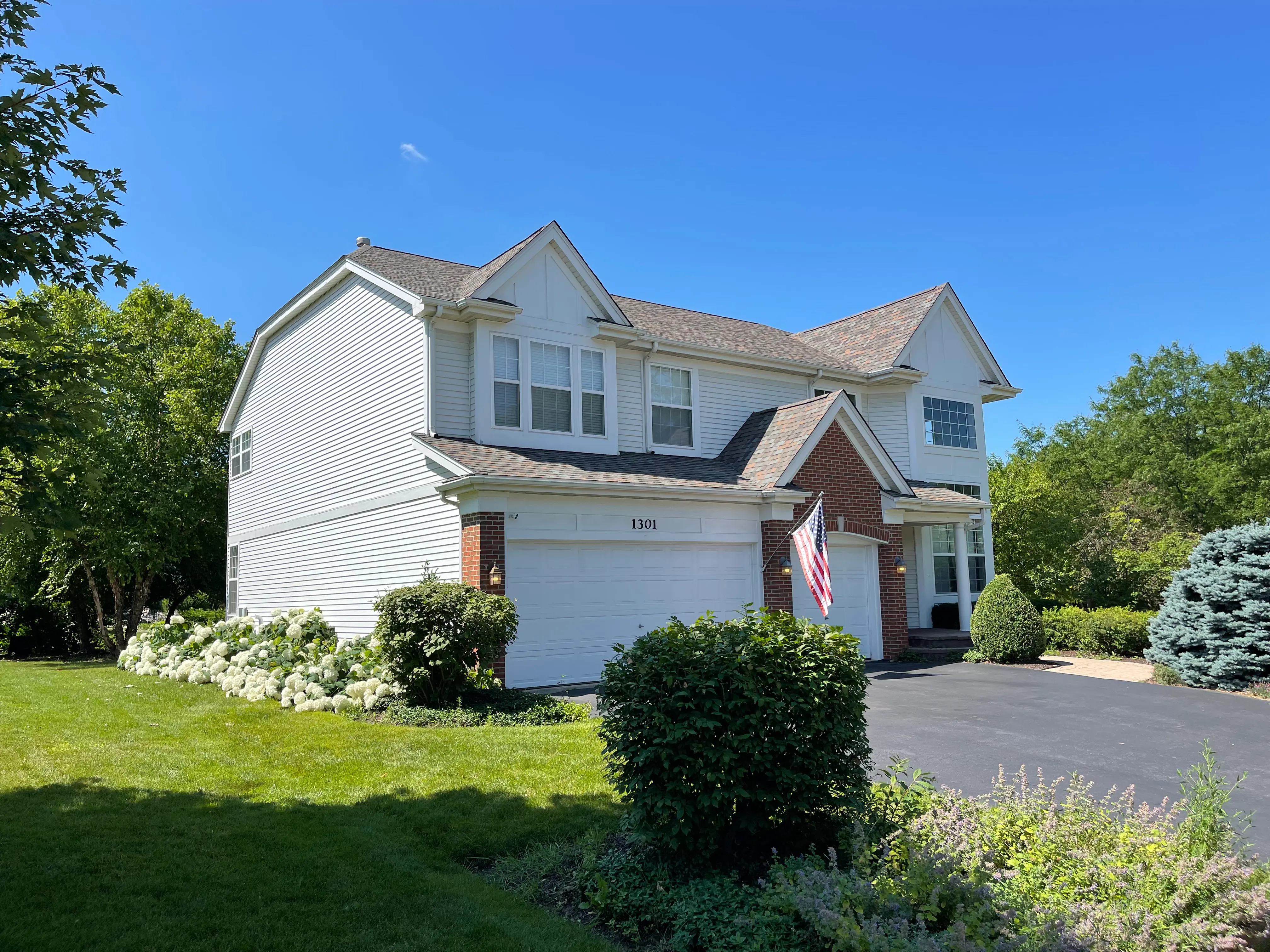Completed Cary IL roof replacement with Owens Corning Duration Aged Copper shingles